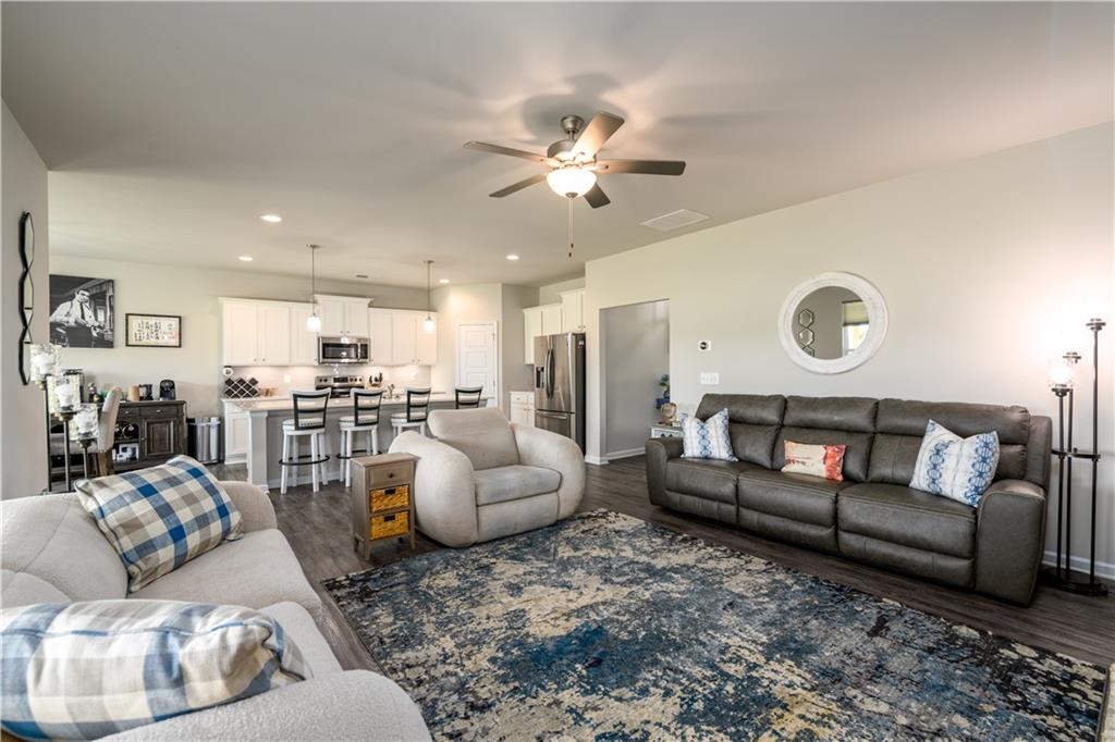 3741 Highway 83 Good Hope, GA 30641 - Photo 24 of 60 a living room with furniture kitchen view and a chandelier