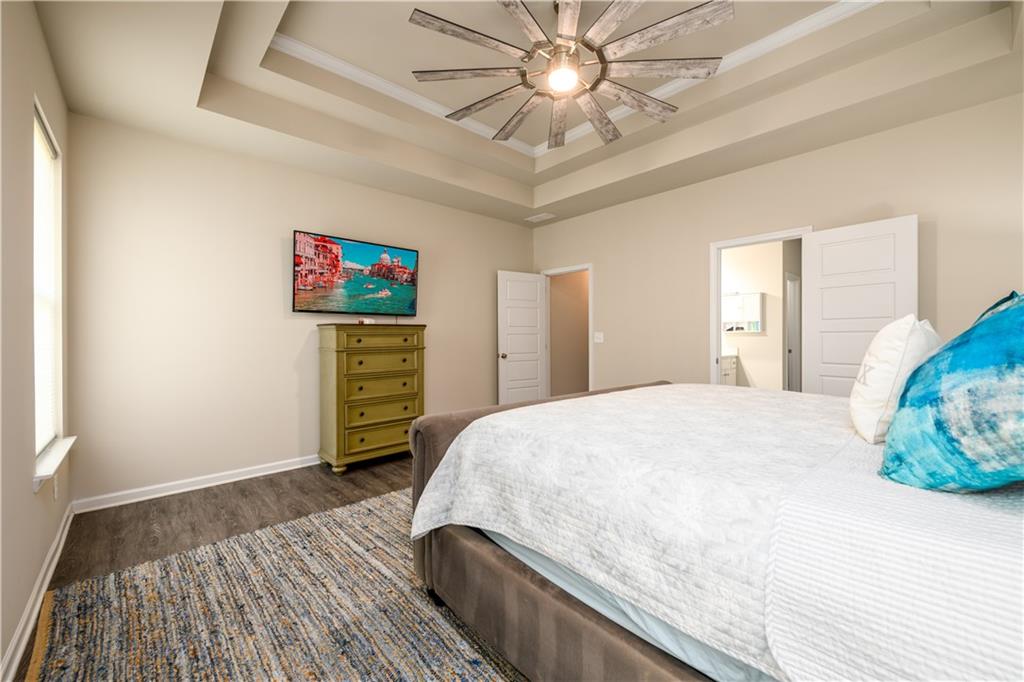 3741 Highway 83 Good Hope, GA 30641 - Photo 25 of 60 a bedroom with a bed and a flat screen tv