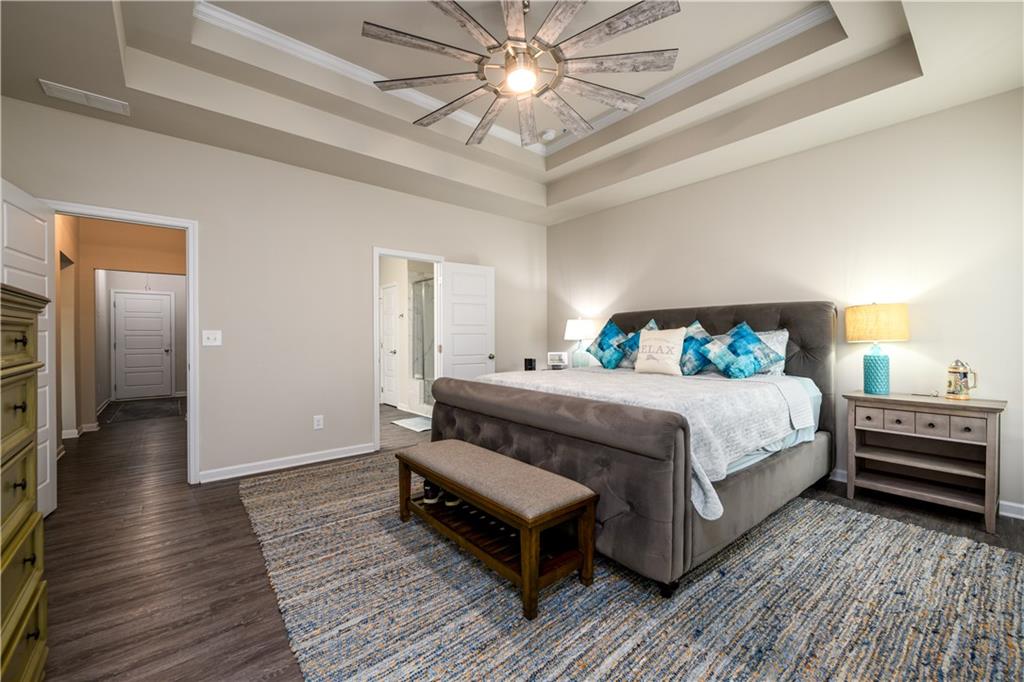 3741 Highway 83 Good Hope, GA 30641 - Photo 26 of 60 a bedroom with a bed and wooden floor