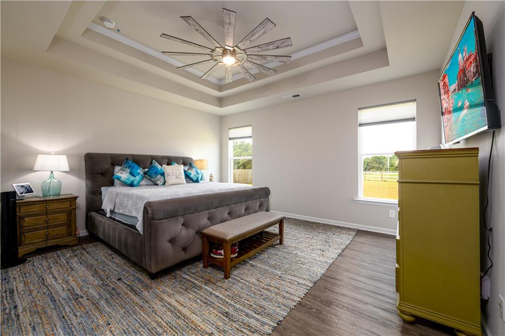 3741 Highway 83 Good Hope, GA 30641 - Photo 27 of 60 a bedroom with a bed and a flat screen tv