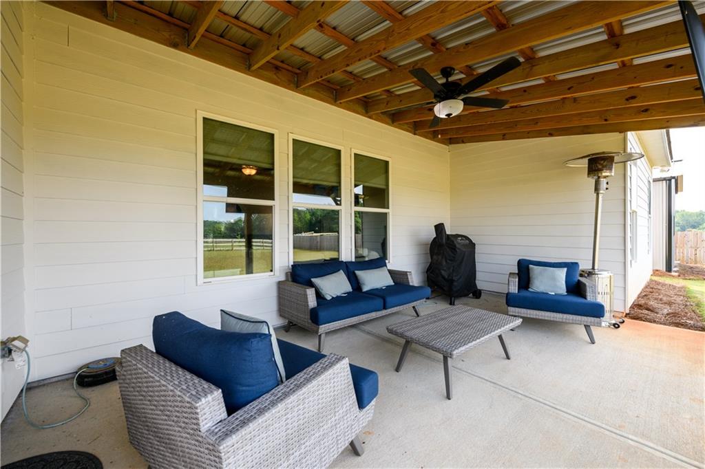 3741 Highway 83 Good Hope, GA 30641 - Photo 34 of 60 a living room with furniture and a large window