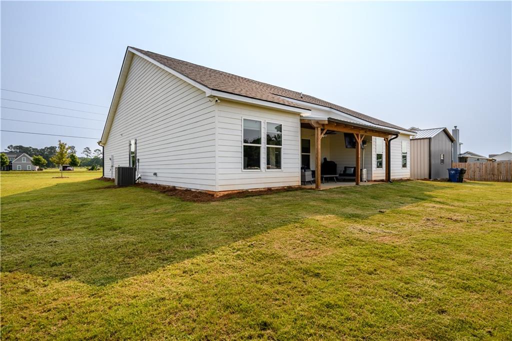 3741 Highway 83 Good Hope, GA 30641 - Photo 39 of 60 a view of a house with a yard