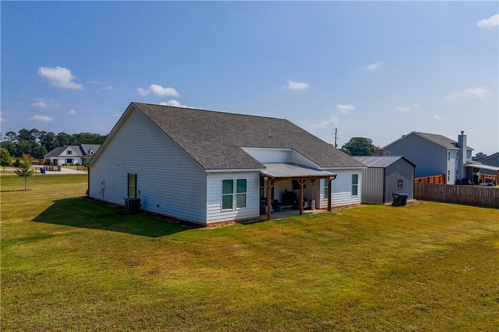 3741 Highway 83 Good Hope, GA 30641 - Photo 46 of 60 a view of a house with a big yard and large trees