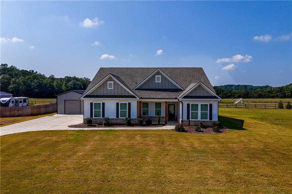 3741 Highway 83 Good Hope, GA 30641 - Photo 47 of 60 a front view of a house with swimming pool yard and outdoor seating