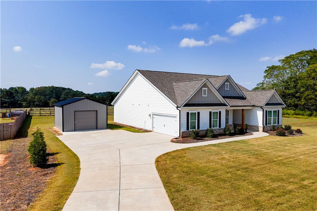 3741 Highway 83 Good Hope, GA 30641 - Photo 48 of 60 a view of house with yard outdoor seating and covered with trees