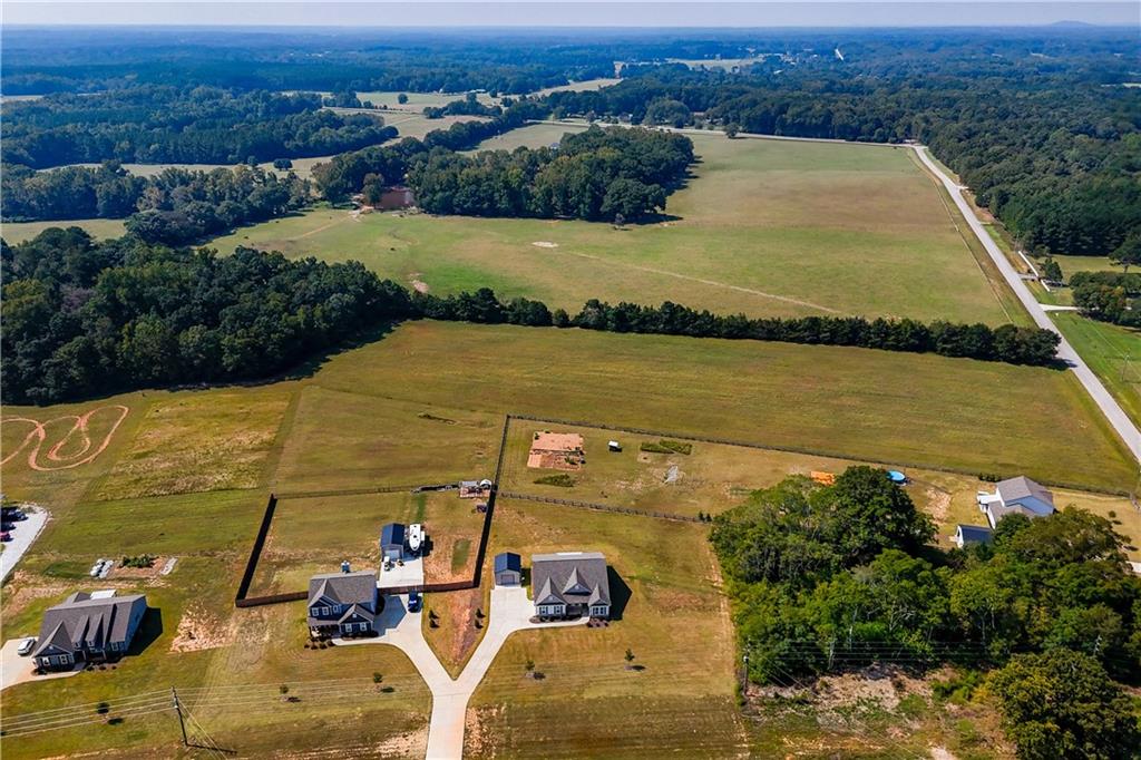 3741 Highway 83 Good Hope, GA 30641 - Photo 51 of 60 an aerial view of a house with a ocean view