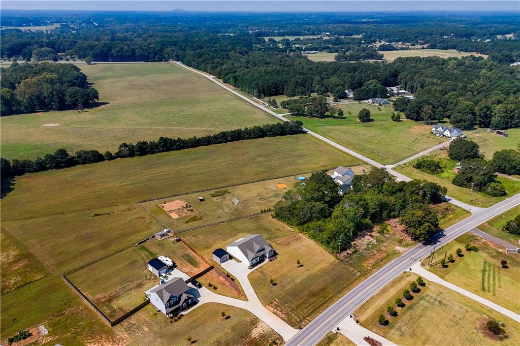 3741 Highway 83 Good Hope, GA 30641 - Photo 52 of 60 an aerial view of a house with a ocean view