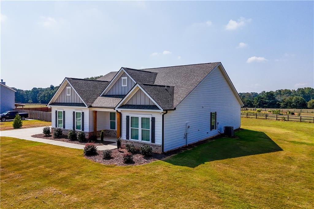 3741 Highway 83 Good Hope, GA 30641 - Photo 56 of 60 a view of a house with swimming pool and sitting area