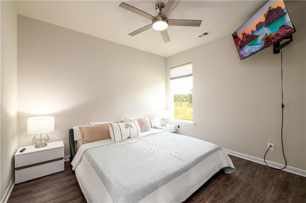 3741 Highway 83 Good Hope, GA 30641 - Photo 7 of 60 a bedroom with a bed and a window