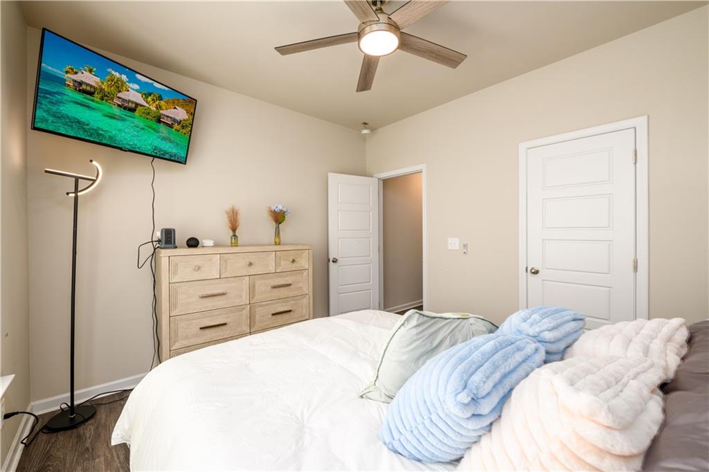 3741 Highway 83 Good Hope, GA 30641 - Photo 9 of 60 a bedroom with a bed and a flat screen tv