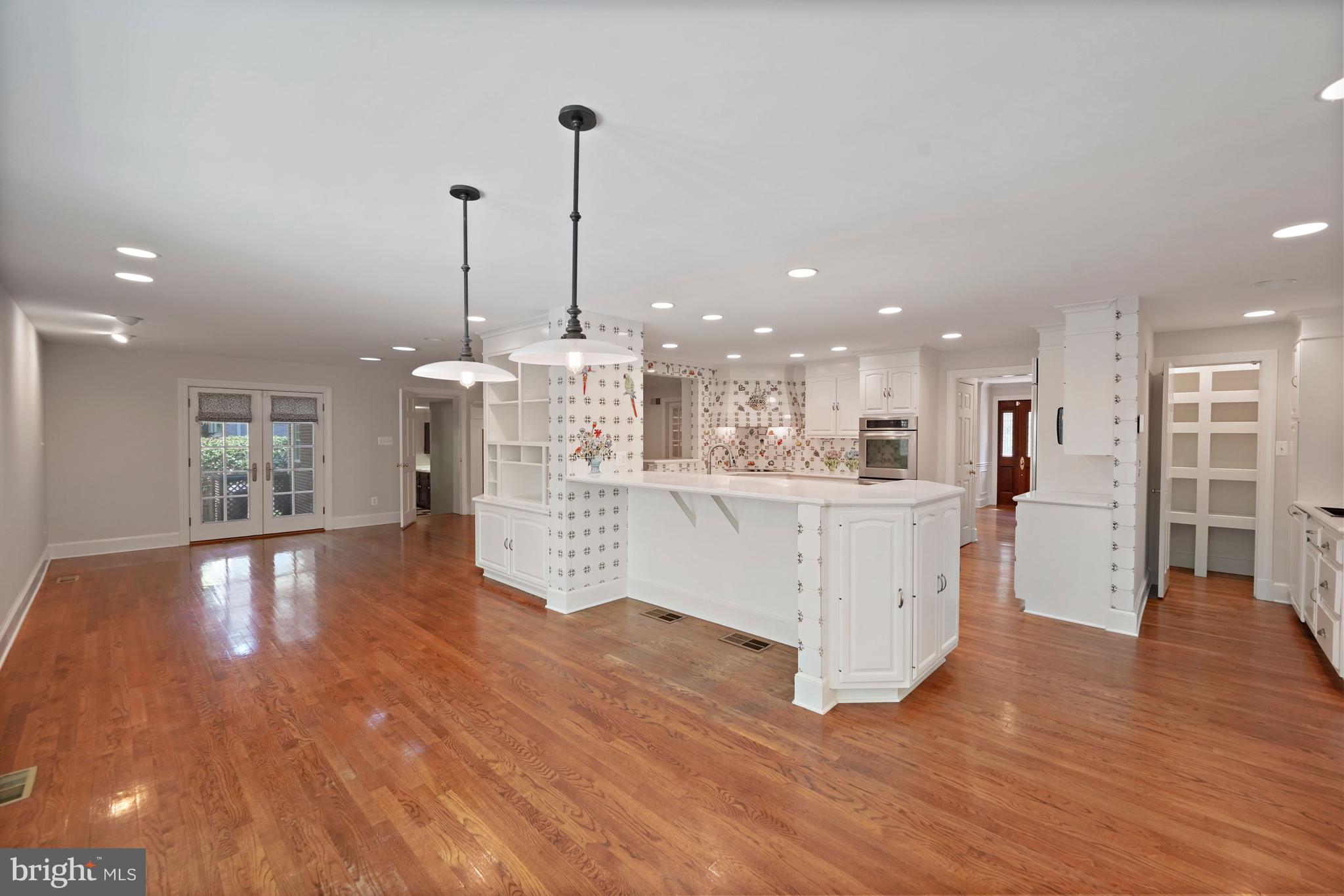 1226 Aldebaran Drive McLean, VA 22101 - Photo 12 of 40 a view of a kitchen with furniture and wooden floor