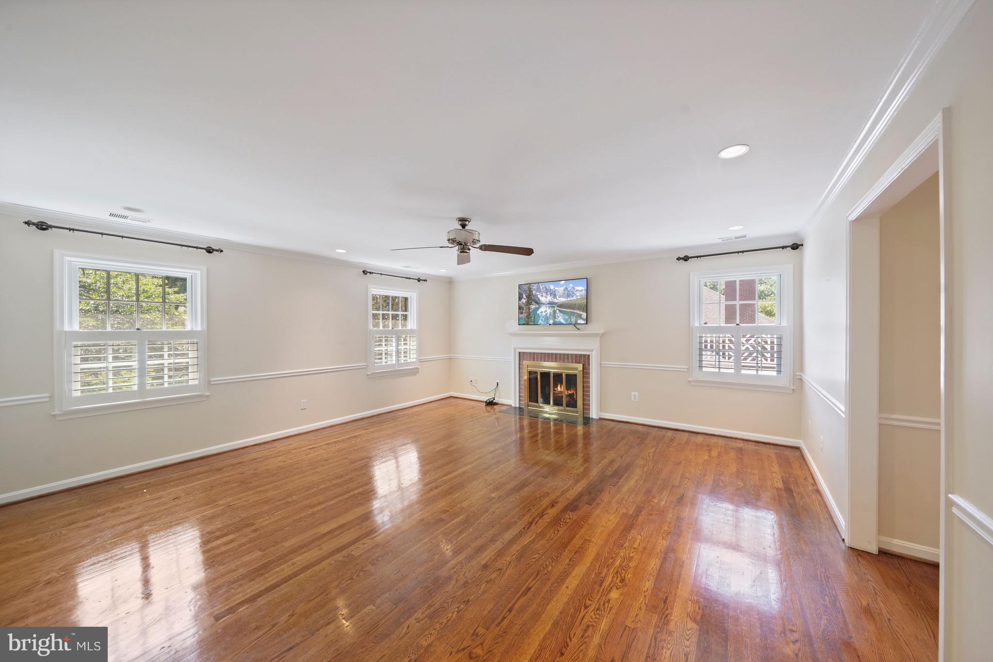 1226 Aldebaran Drive McLean, VA 22101 - Photo 18 of 40 a view of an empty room with a window and wooden floor