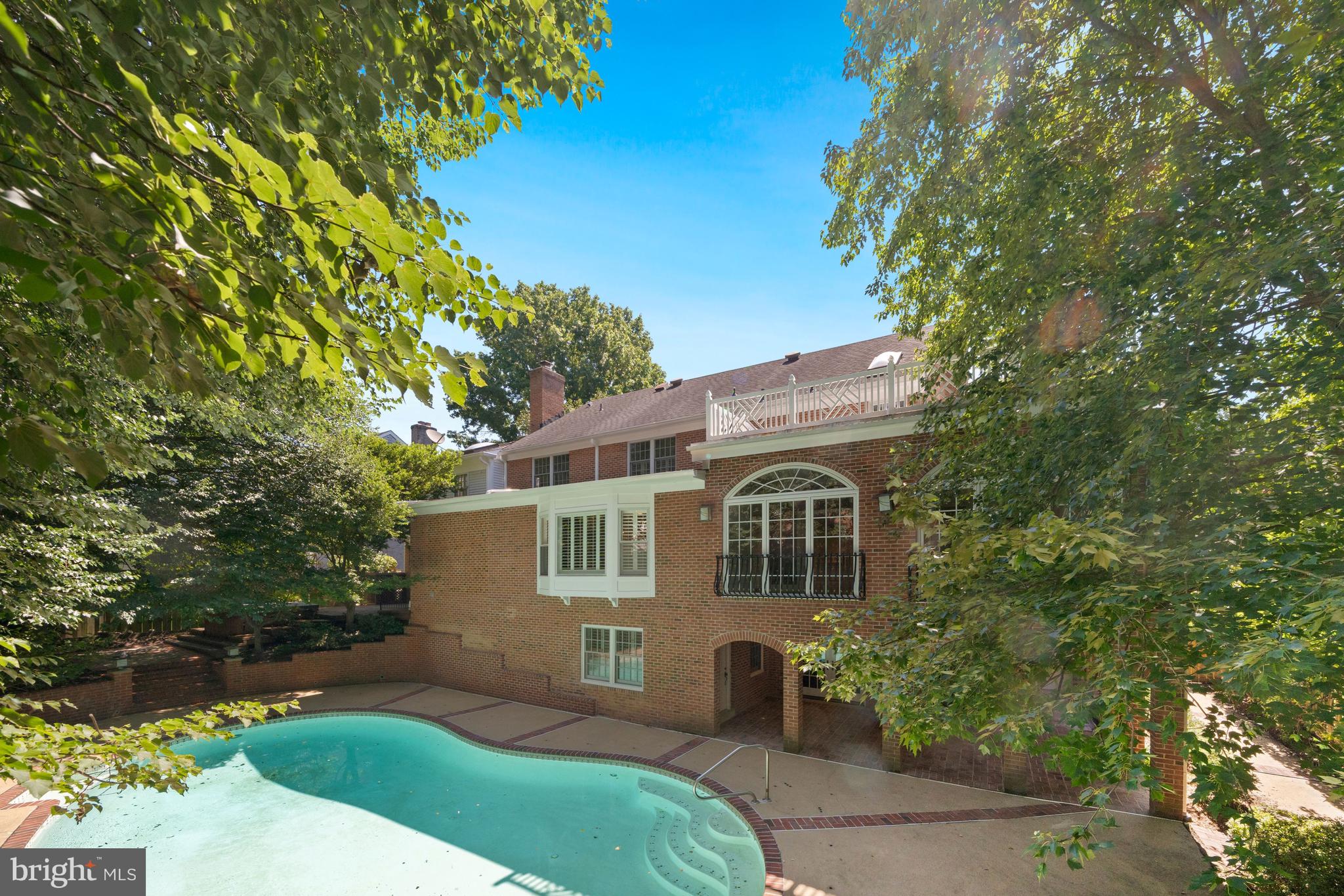 1226 Aldebaran Drive McLean, VA 22101 - Photo 2 of 40 a front view of a house with a yard