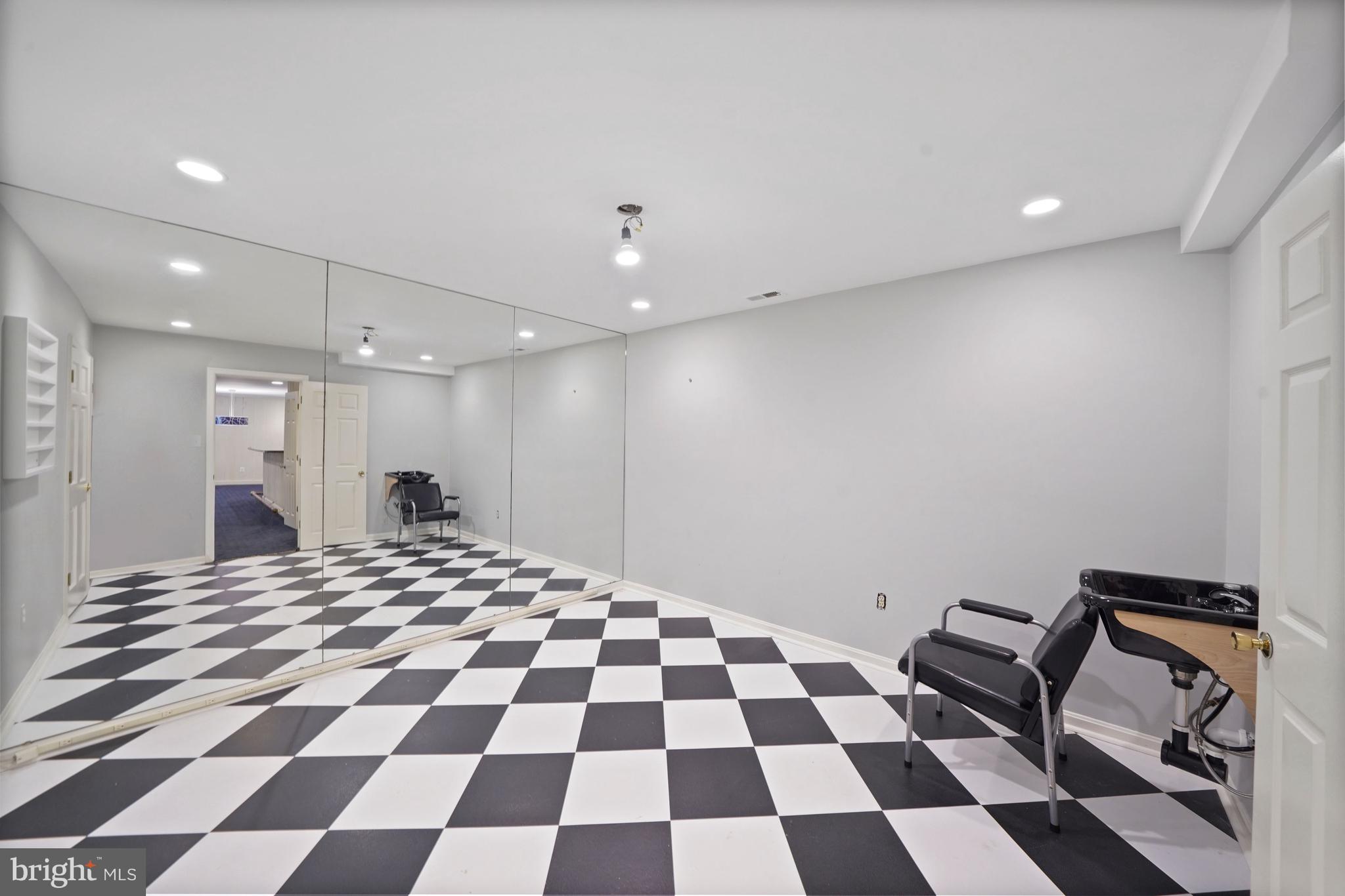 1226 Aldebaran Drive McLean, VA 22101 - Photo 30 of 40 a view of a room with a black and white checkered floor