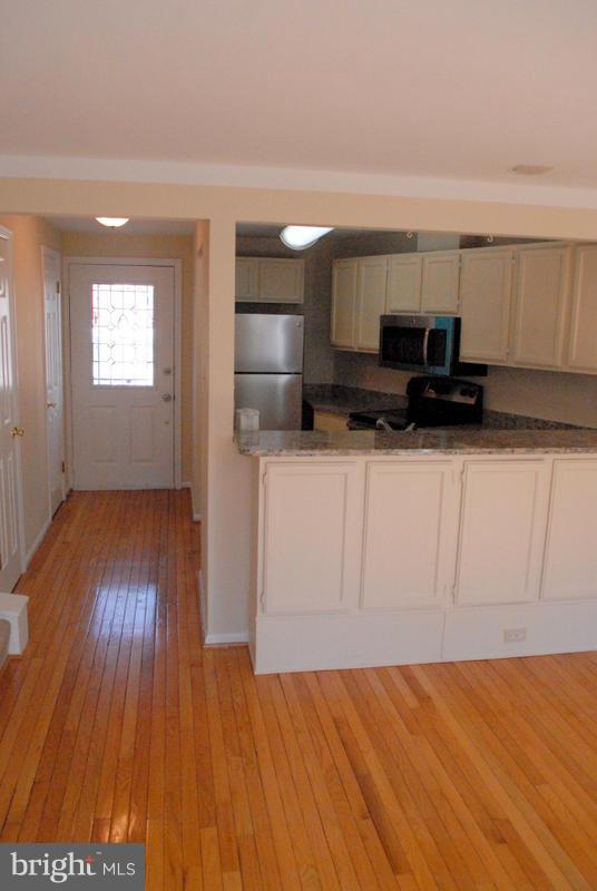 2143 Whisper Way Reston, VA 20191 - Photo 11 of 30 Living Room view to Entry