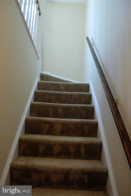 2143 Whisper Way Reston, VA 20191 - Photo 12 of 30 Stairs to Master on Upper Level