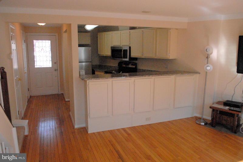 2143 Whisper Way Reston, VA 20191 - Photo 10 of 30 Hardwood Floors in Living Room