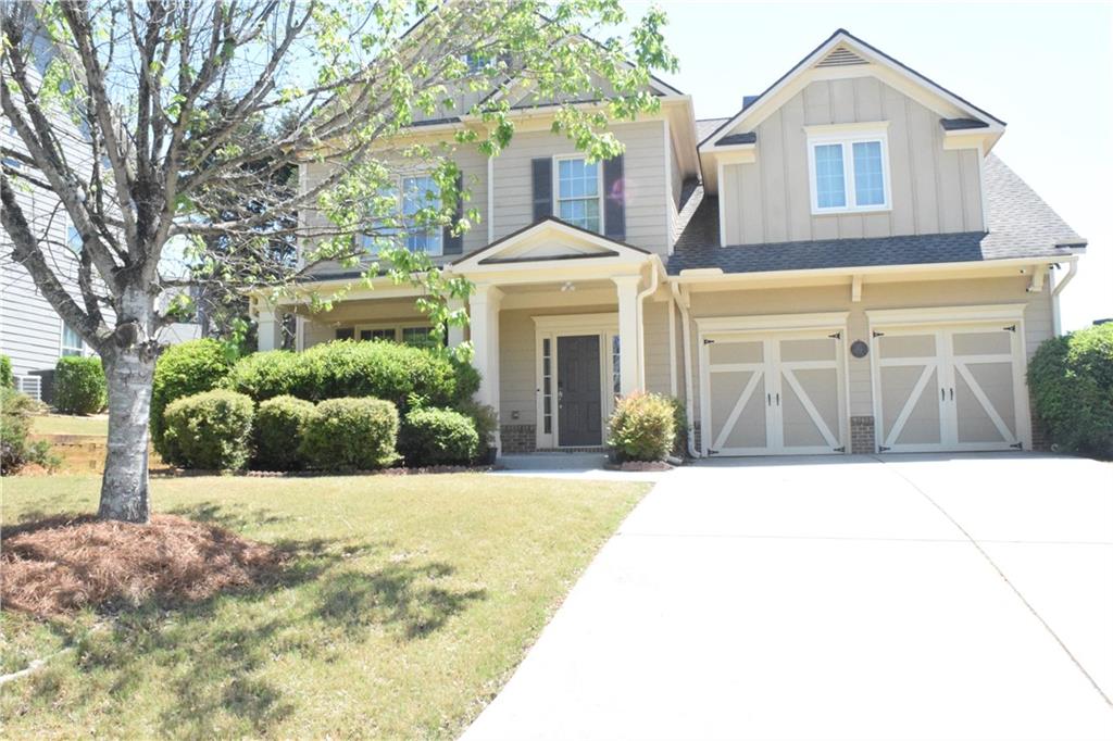 505 Wicklowe Place Acworth, GA 30102 - Photo 1 of 51 a front view of a house with a garden