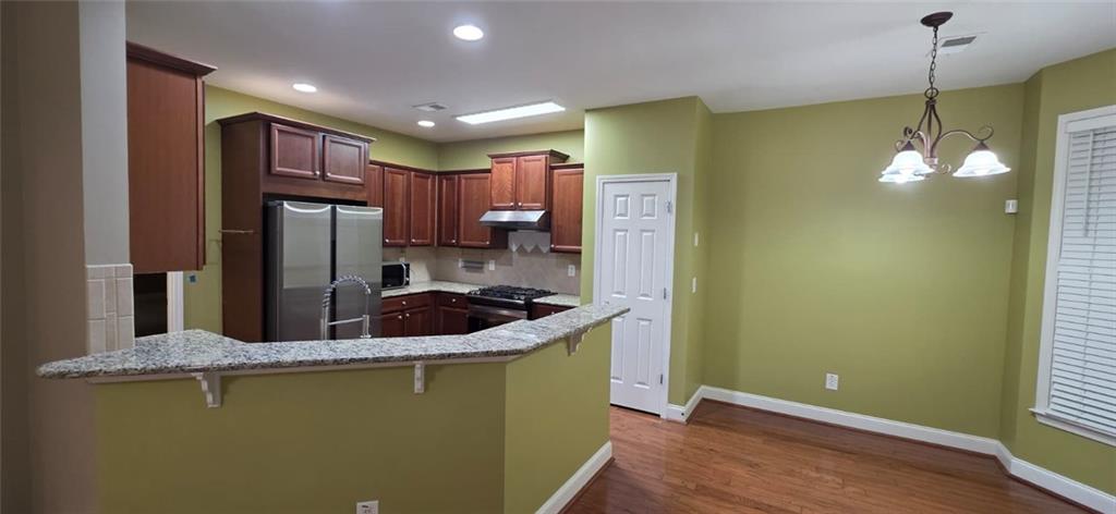 505 Wicklowe Place Acworth, GA 30102 - Photo 13 of 51 a kitchen with sink and refrigerator