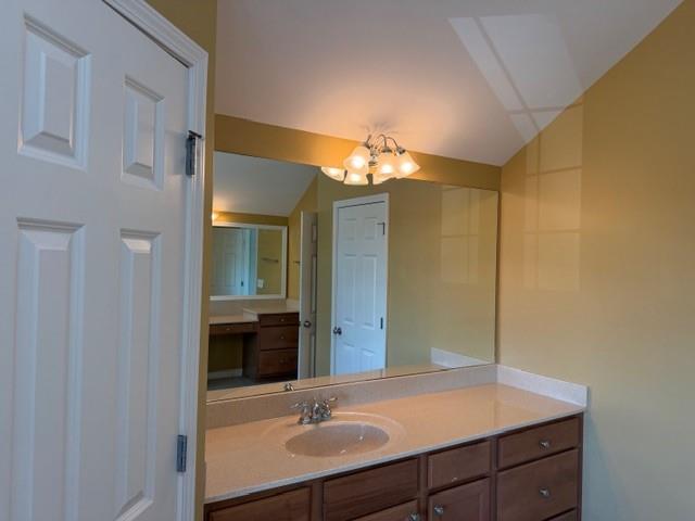 505 Wicklowe Place Acworth, GA 30102 - Photo 35 of 51 a bathroom with a sink and a mirror