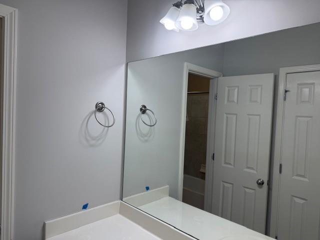 505 Wicklowe Place Acworth, GA 30102 - Photo 37 of 51 a bathroom with a sink a light fixture and a toilet