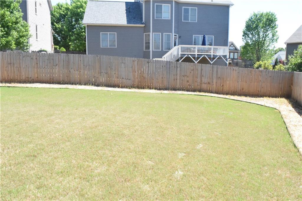 505 Wicklowe Place Acworth, GA 30102 - Photo 43 of 51 a view of a backyard with a small pool
