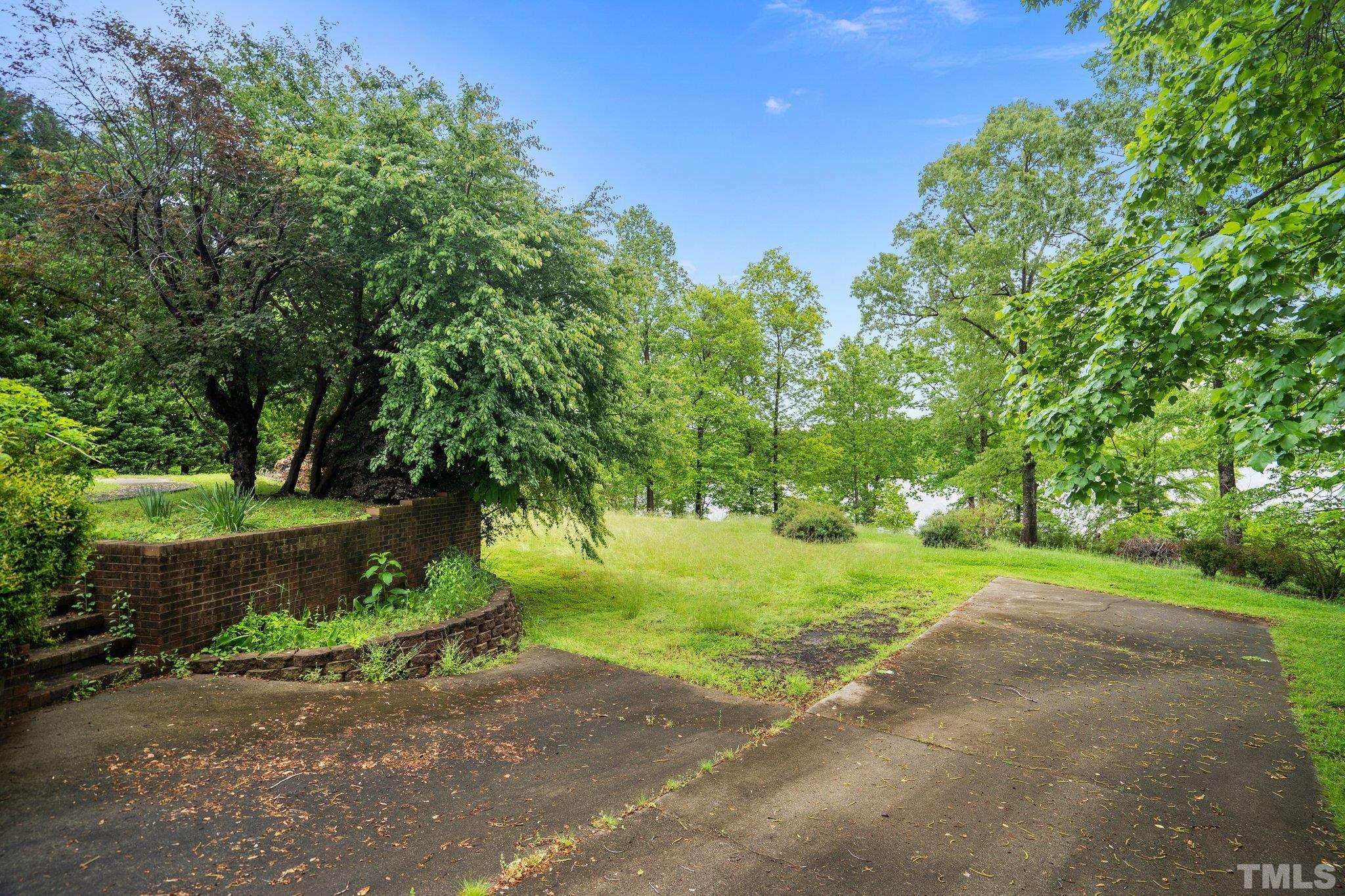 268 Dean Lane Roxboro, NC 27574 - Photo 12 of 38 a view of a park with plants and trees