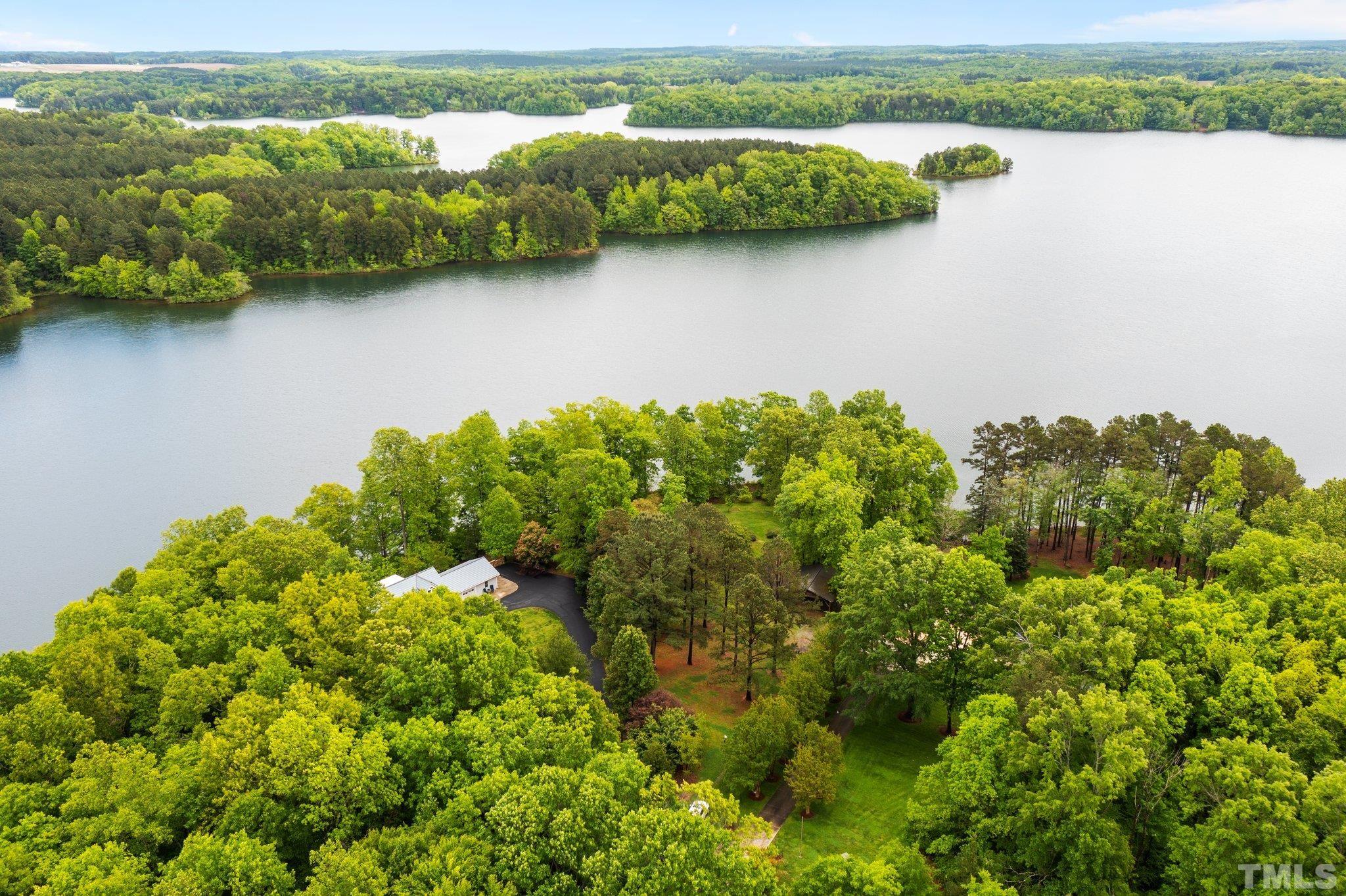 268 Dean Lane Roxboro, NC 27574 - Photo 14 of 38 view of lake with green space