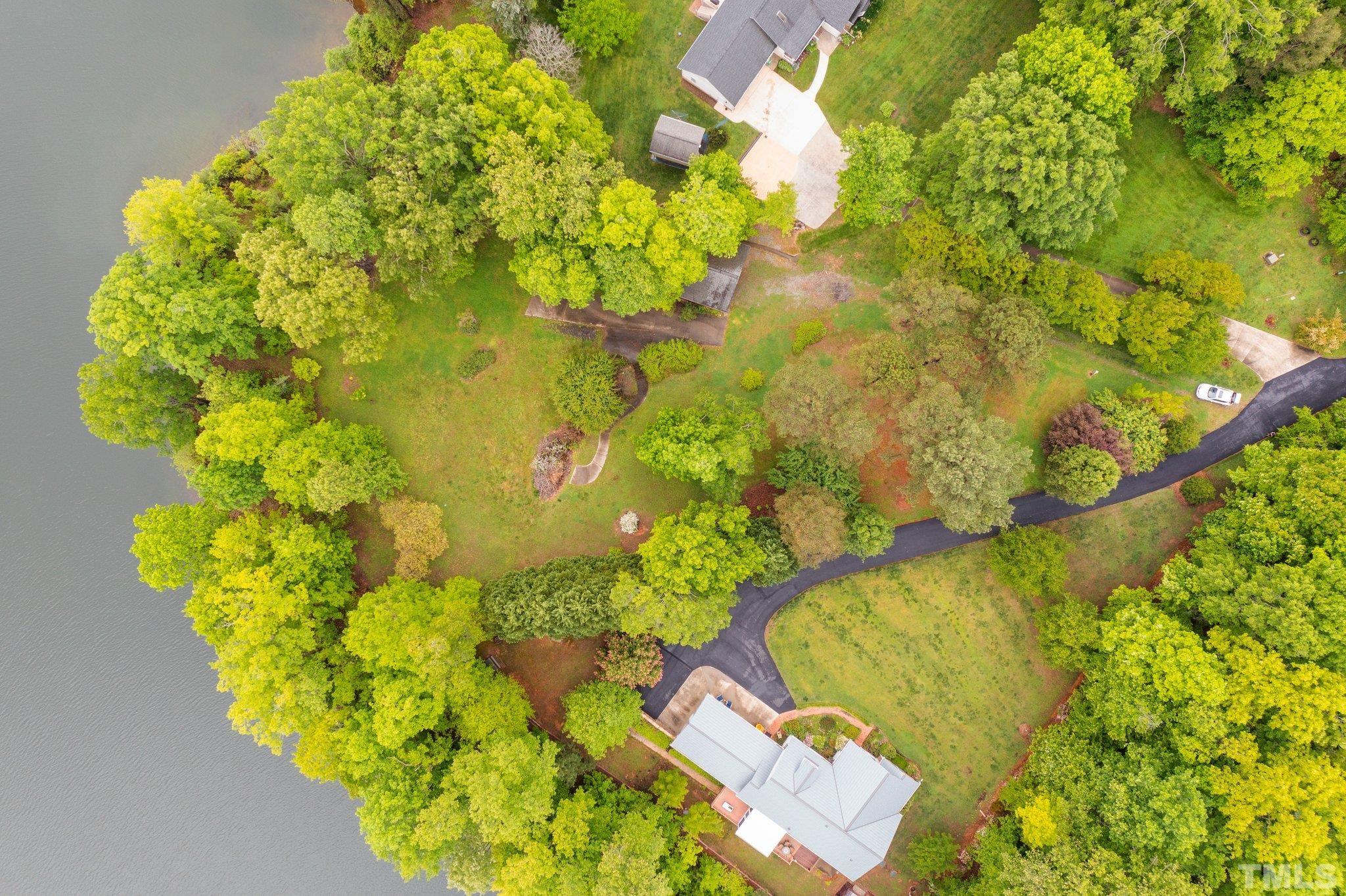 268 Dean Lane Roxboro, NC 27574 - Photo 20 of 38 a close up of a flower in a garden