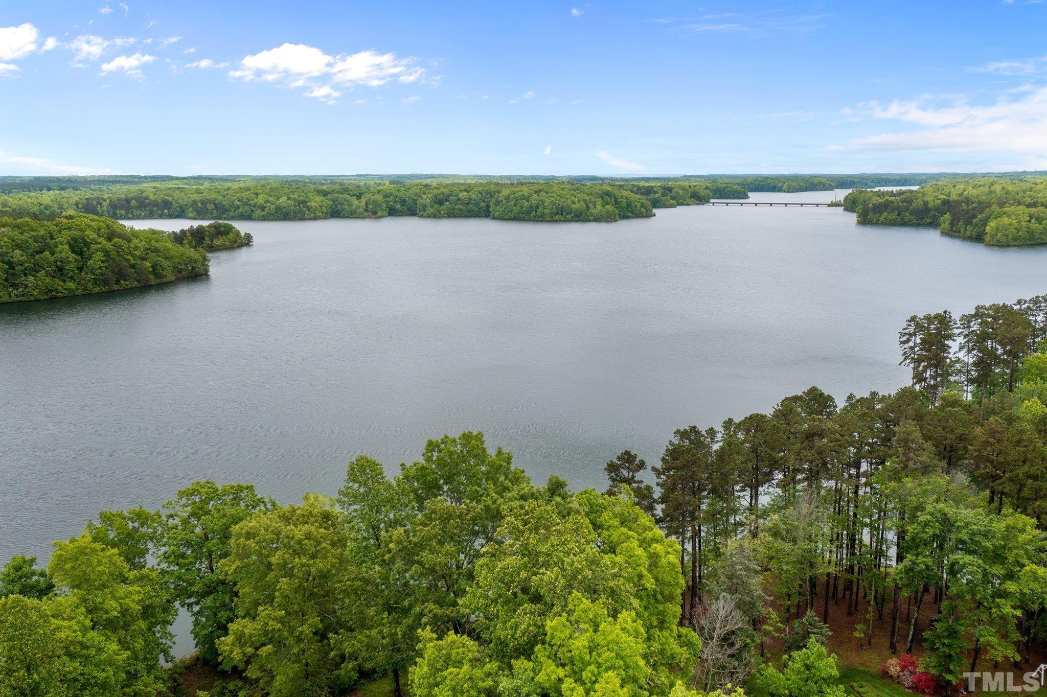 268 Dean Lane Roxboro, NC 27574 - Photo 29 of 38 a view of a lake with a yard