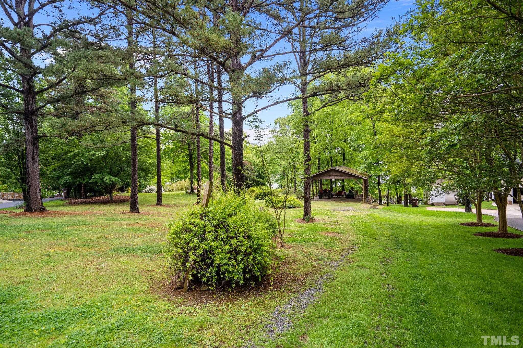 268 Dean Lane Roxboro, NC 27574 - Photo 4 of 38 a big yard with lots of green space and trees