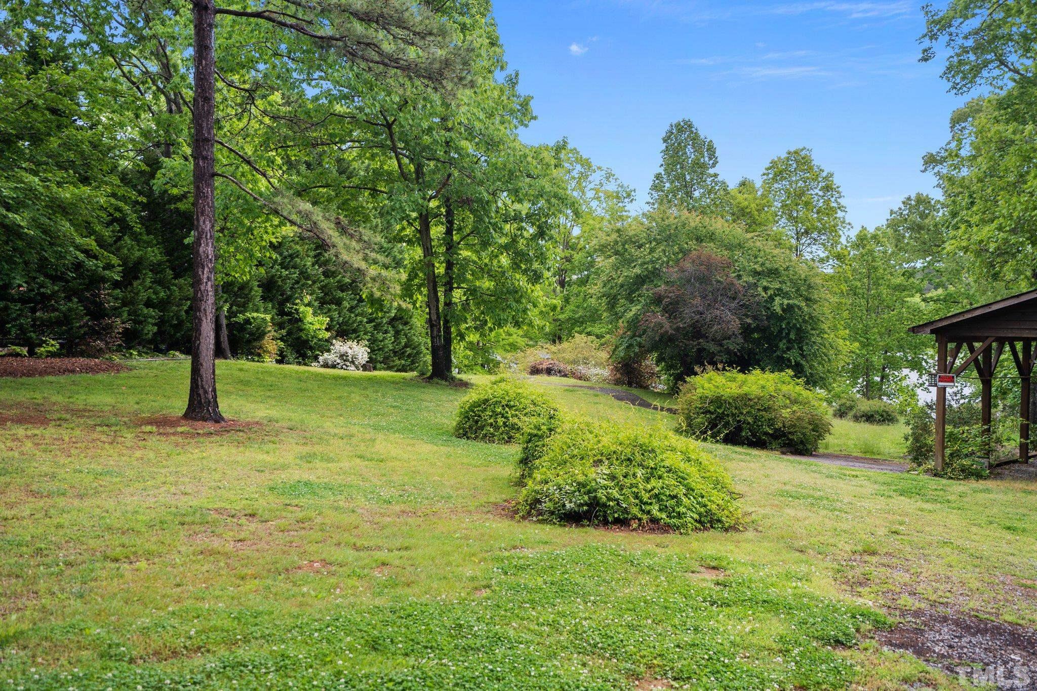 268 Dean Lane Roxboro, NC 27574 - Photo 5 of 38 a view of a tree in front of a house