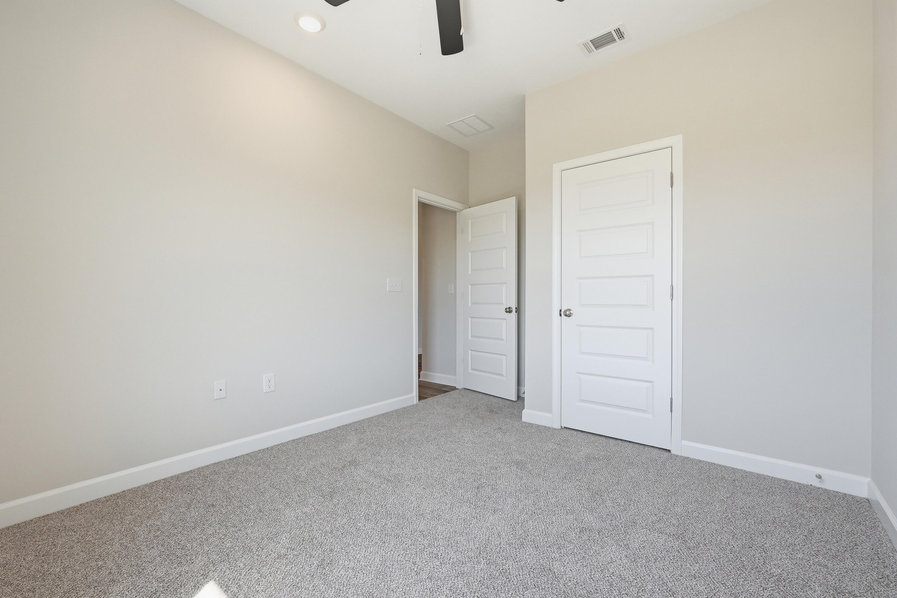 6114 Mildreds Way Crestview, FL 32539 - Photo 20 of 24 an empty room with windows