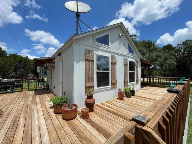 a view of house with patio outdoor seating