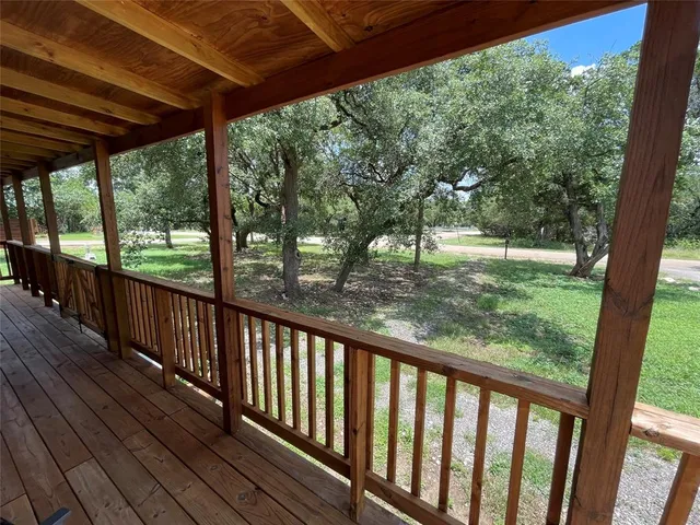 a view of backyard with green space