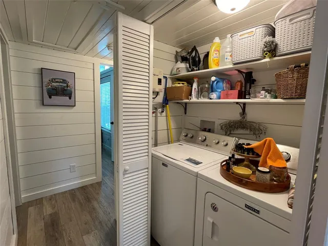 a utility room with dryer and washer