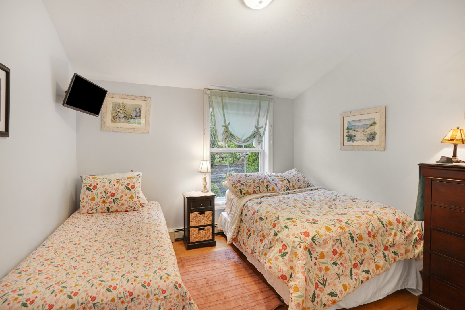8 Fresh Pond Road Oak Bluffs, MA 02557 - Photo 19 of 36 a bedroom with a bed and a flat screen tv
