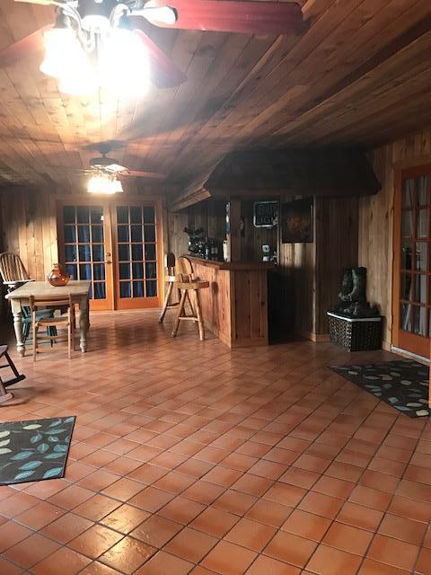 2245 Bacom Point Road Pahokee, FL 33476 - Photo 4 of 24 Back Lot Home Entertainment Room and Bar