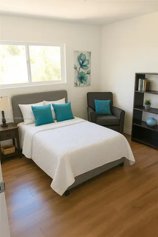 a white toilet sitting next to a bath tub