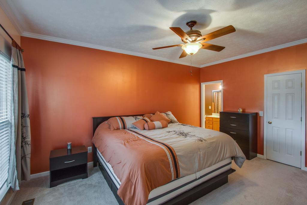 86 Big Springs Road Lebanon, TN 37087 - Photo 15 of 27 a bedroom with a bed and ceiling fan