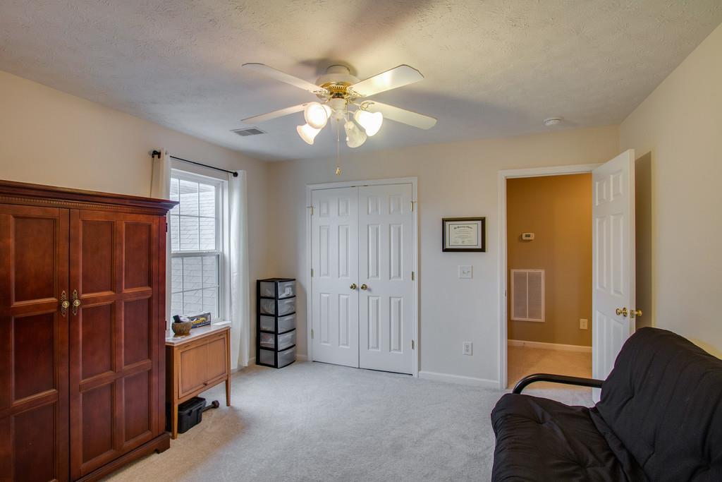 86 Big Springs Road Lebanon, TN 37087 - Photo 21 of 27 a living room with furniture and a ceiling fan