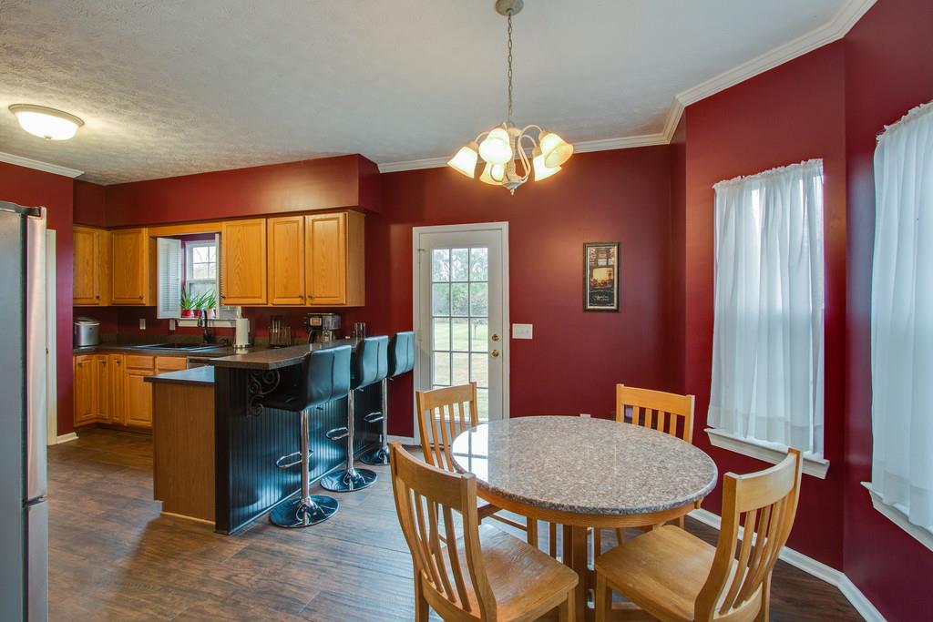 86 Big Springs Road Lebanon, TN 37087 - Photo 8 of 27 a view of a dining room with furniture window and wooden floor