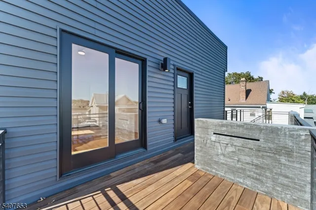 a view of a brick house with a large window