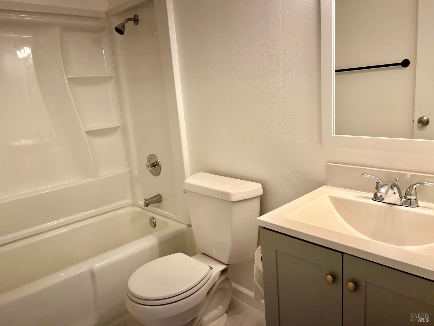 9 Forest Lane San Rafael, CA 94903 - Photo 8 of 11 a bathroom with a sink a toilet and shower