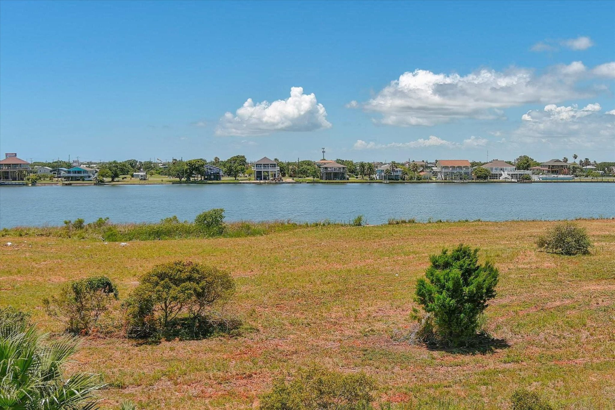 a view of a lake with a mountain in the background