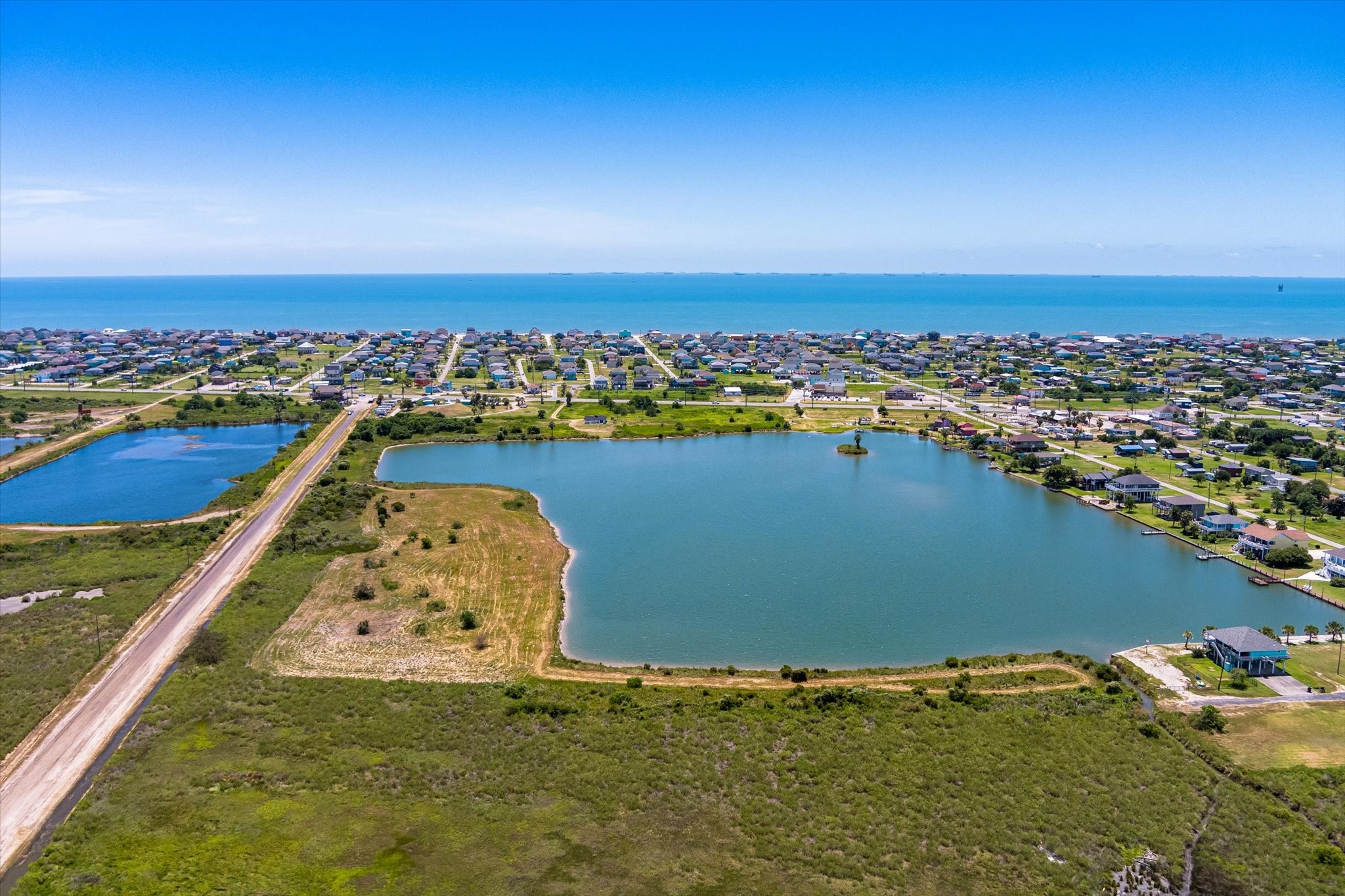 1105 Bob Road Crystal Beach, TX 77650 - Photo 18 of 23 an aerial view of a house