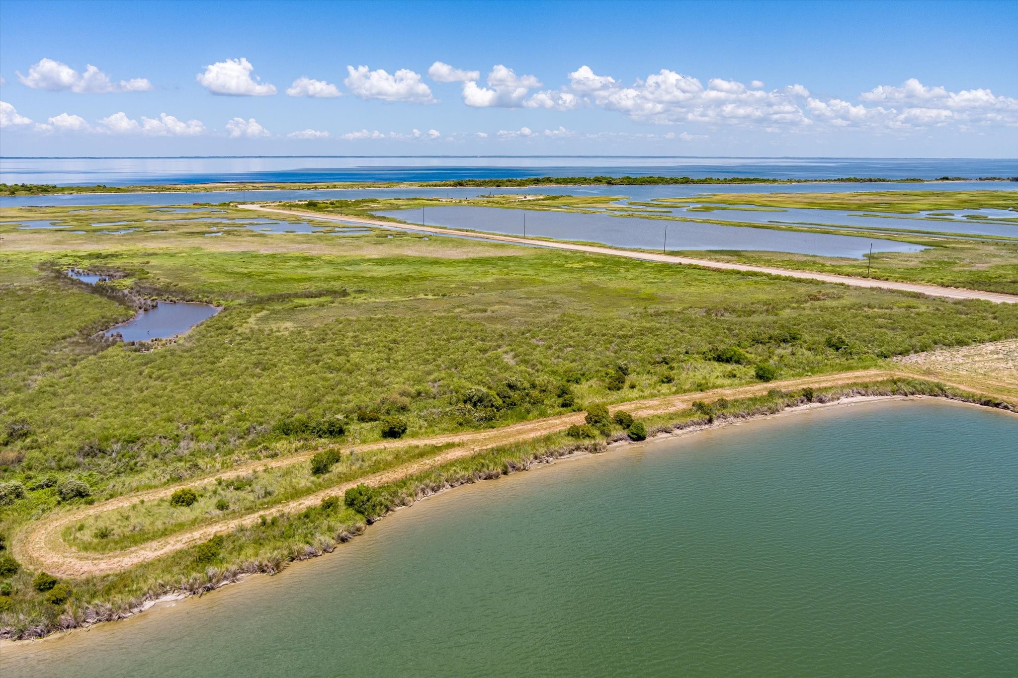 1105 Bob Road Crystal Beach, TX 77650 - Photo 8 of 23 a view of an ocean and a mountain