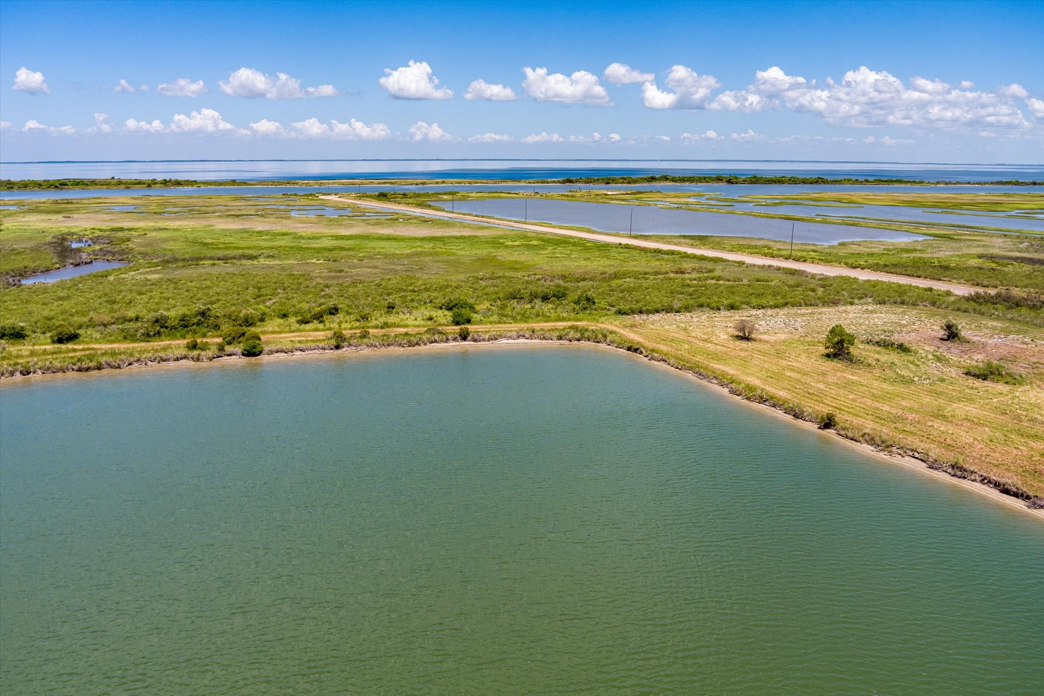 1105 Bob Road Crystal Beach, TX 77650 - Photo 9 of 23 a view of a room with a swimming pool