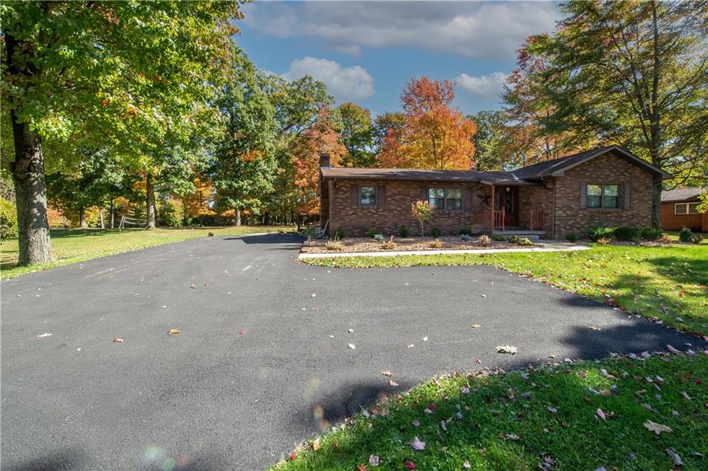 481 South Eberhart Road Butler, PA 16001 - Photo 1 of 25 a view of a house with a yard and garage