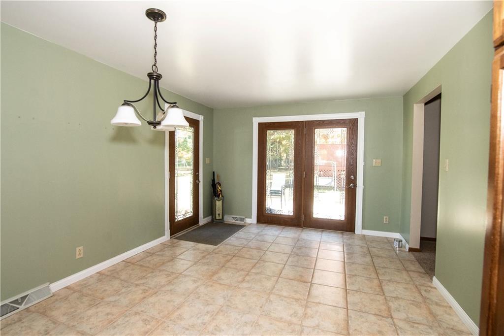 481 South Eberhart Road Butler, PA 16001 - Photo 12 of 25 a view of a room with a chandelier